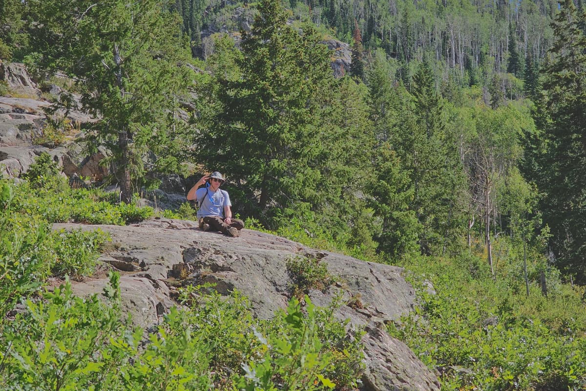 A picture of Zach Vivian on a hike near Fish Creek Falls in Steamboat Springs, Colorado